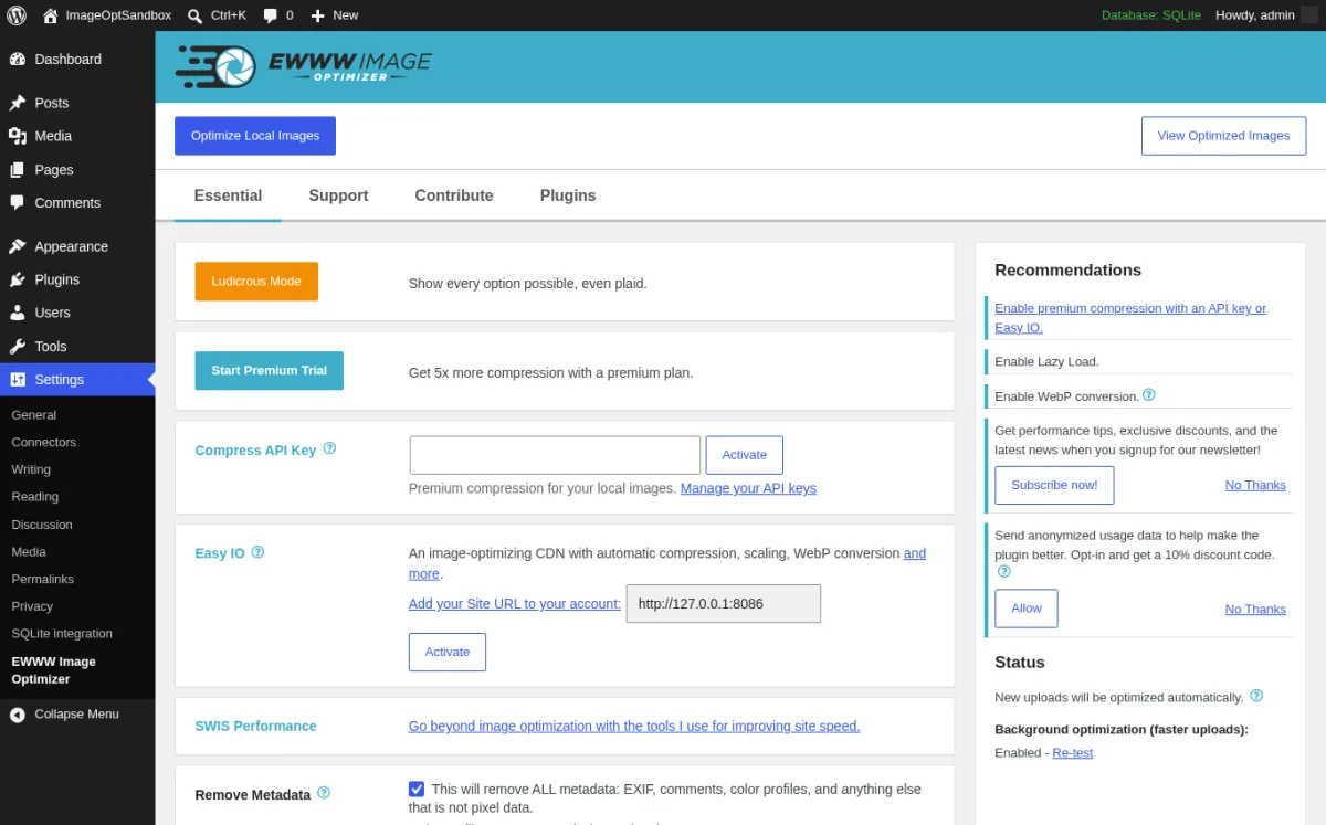 EWWW Image Optimizer Essential settings tab inside a real WordPress install showing the EWWW Image Optimizer header banner, the blue Optimize Local Images and View Optimized Images buttons, the Essential Support Contribute Plugins tab strip, the Ludicrous Mode button, the Start Premium Trial button, the Compress API Key field with Activate, the Easy IO setup with the site URL, the SWIS Performance row, the Remove Metadata toggle, and the right-rail Recommendations panel.