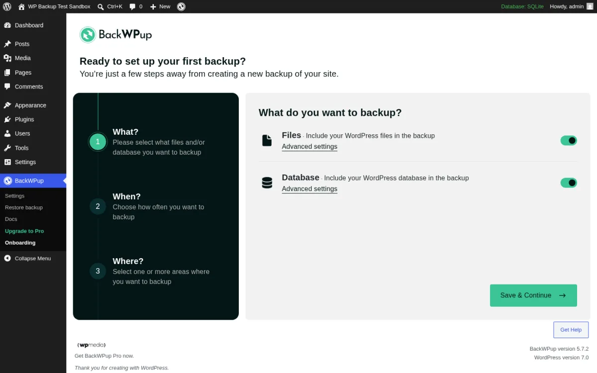BackWPup 5.7.2 onboarding wizard inside a real WordPress install showing the BackWPup logo, the Ready to set up your first backup? heading, the three numbered steps What (Please select what files and/or database you want to backup), When (Choose how often you want to backup) and Where (Select one or more areas where you want to backup), the What do you want to backup? right-hand panel with Files (Include your WordPress files in the backup) and Database (Include your WordPress database in the backup) toggles defaulted to On with Advanced settings links, the Save & Continue button, the Get Help button, the BackWPup left-sidebar menu with Settings, Restore backup, Docs, Upgrade to Pro and Onboarding, and the Get BackWPup Pro now footer.